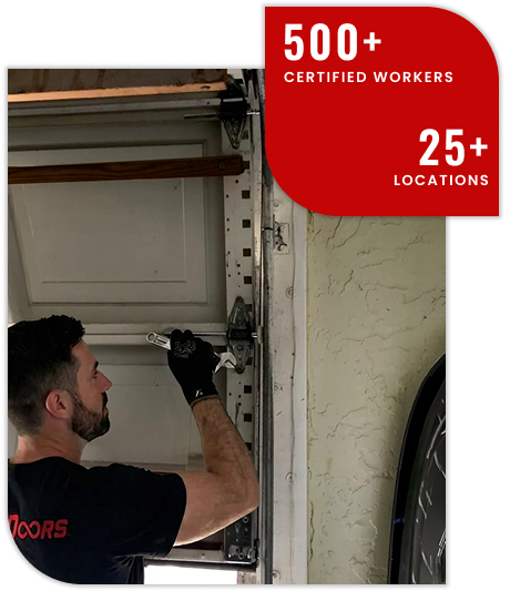 Everdoors-Worker-Fixing-Garage-Door (1)